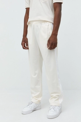 adidas Originals pantaloni de trening barbati, culoarea bej, cu imprimeu